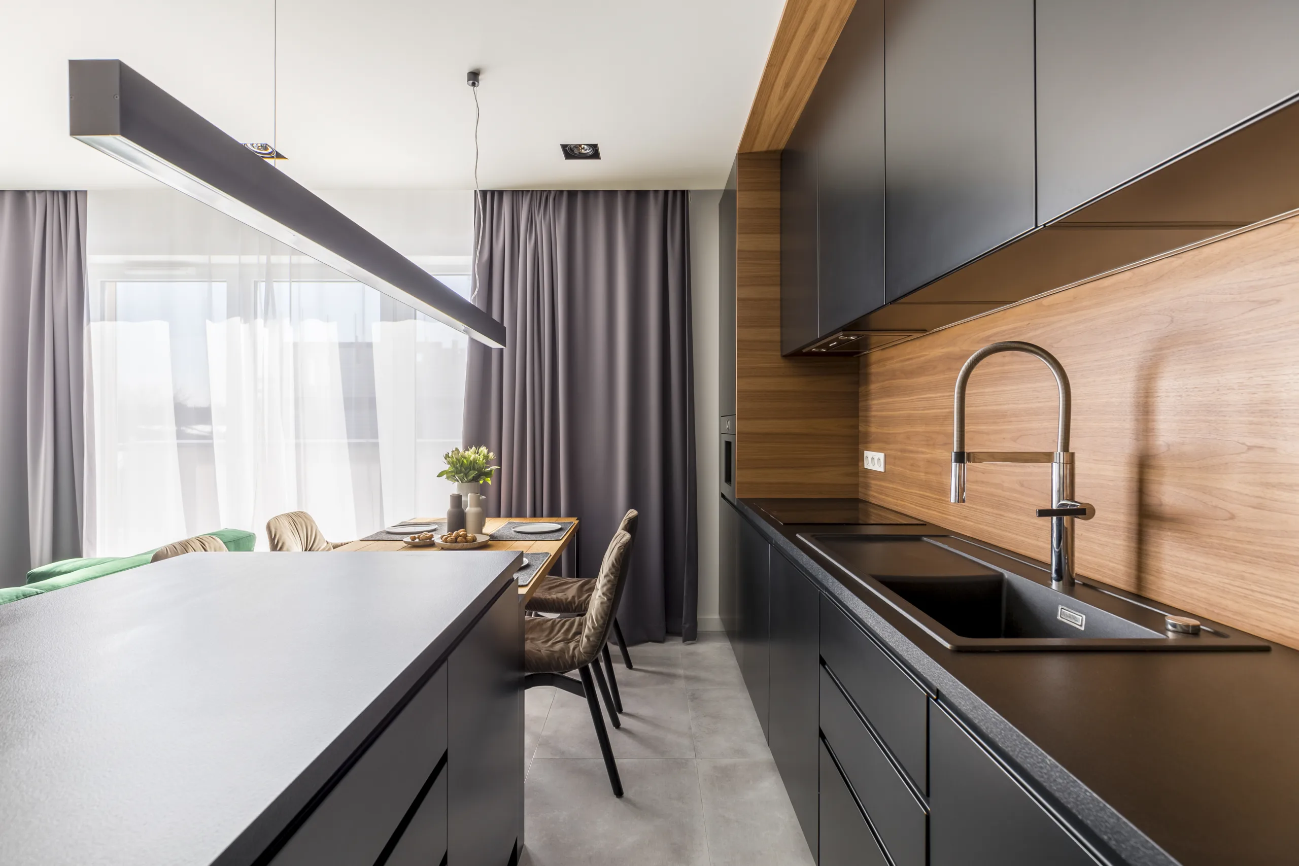 https://ootwc.com/wp-content/uploads/2023/01/Black-Kitchen-Cabinets-2-scaled.webp